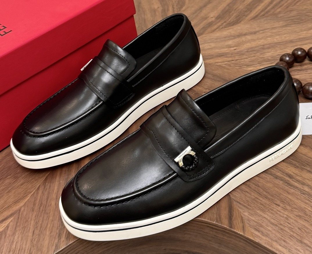 Salvatore Ferragamo Black Loafers with White Soles