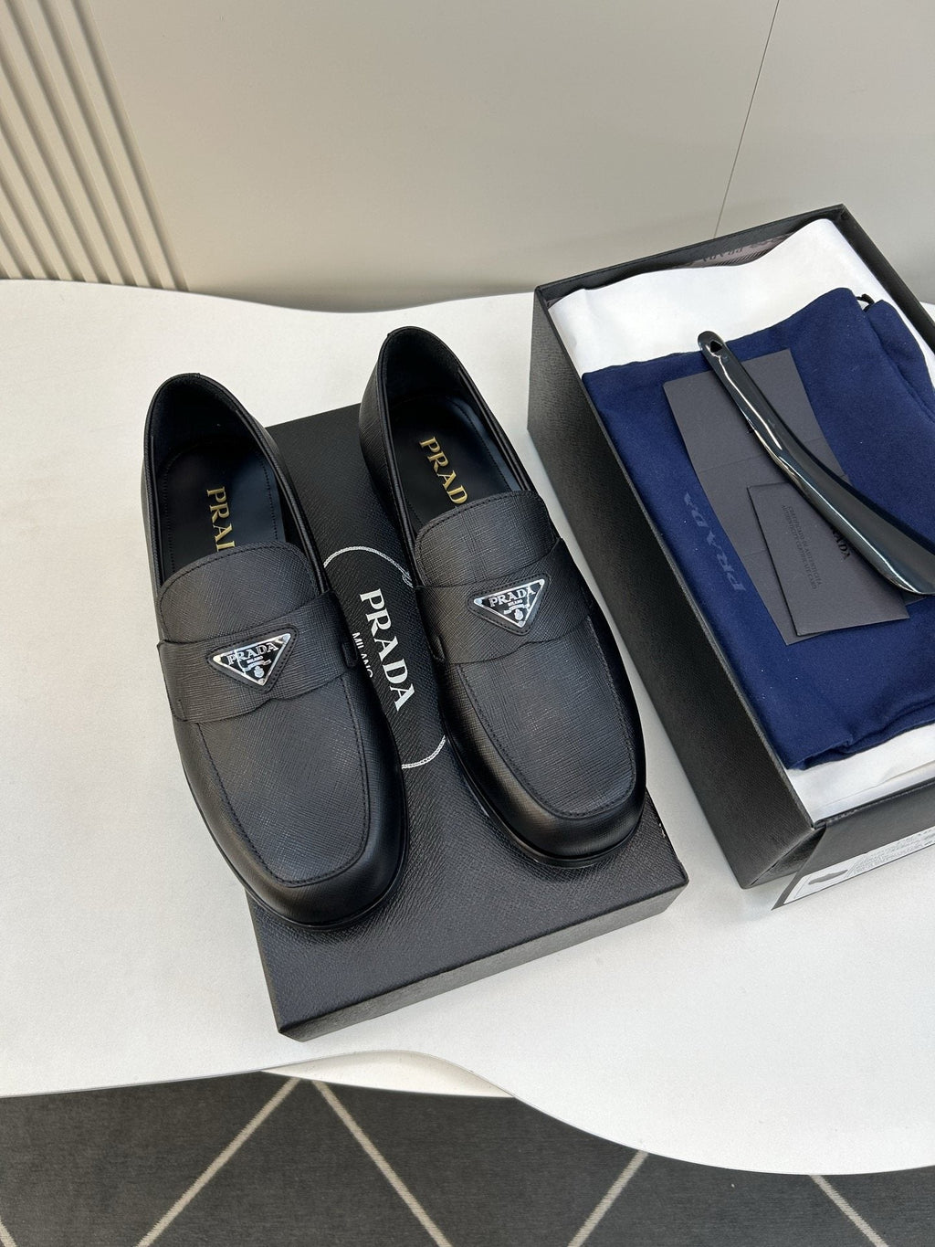 Prada Black Triangular Plaque Loafers